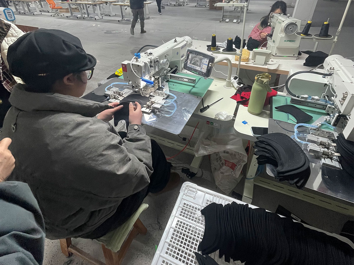 Stitching station at Yuchen Hat Co., Ltd.